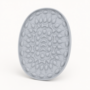 Oval Silicone Cat Lick Mat for Slow Feeding on a clean background