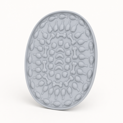Oval Silicone Cat Lick Mat for Slow Feeding on a clean background